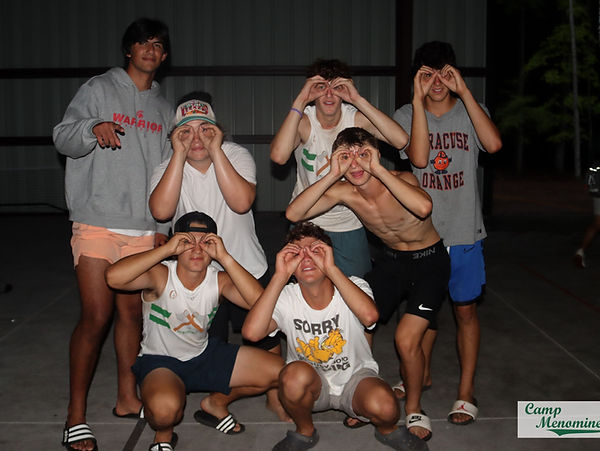 A group of campers poses for the camera at Camp Menominee